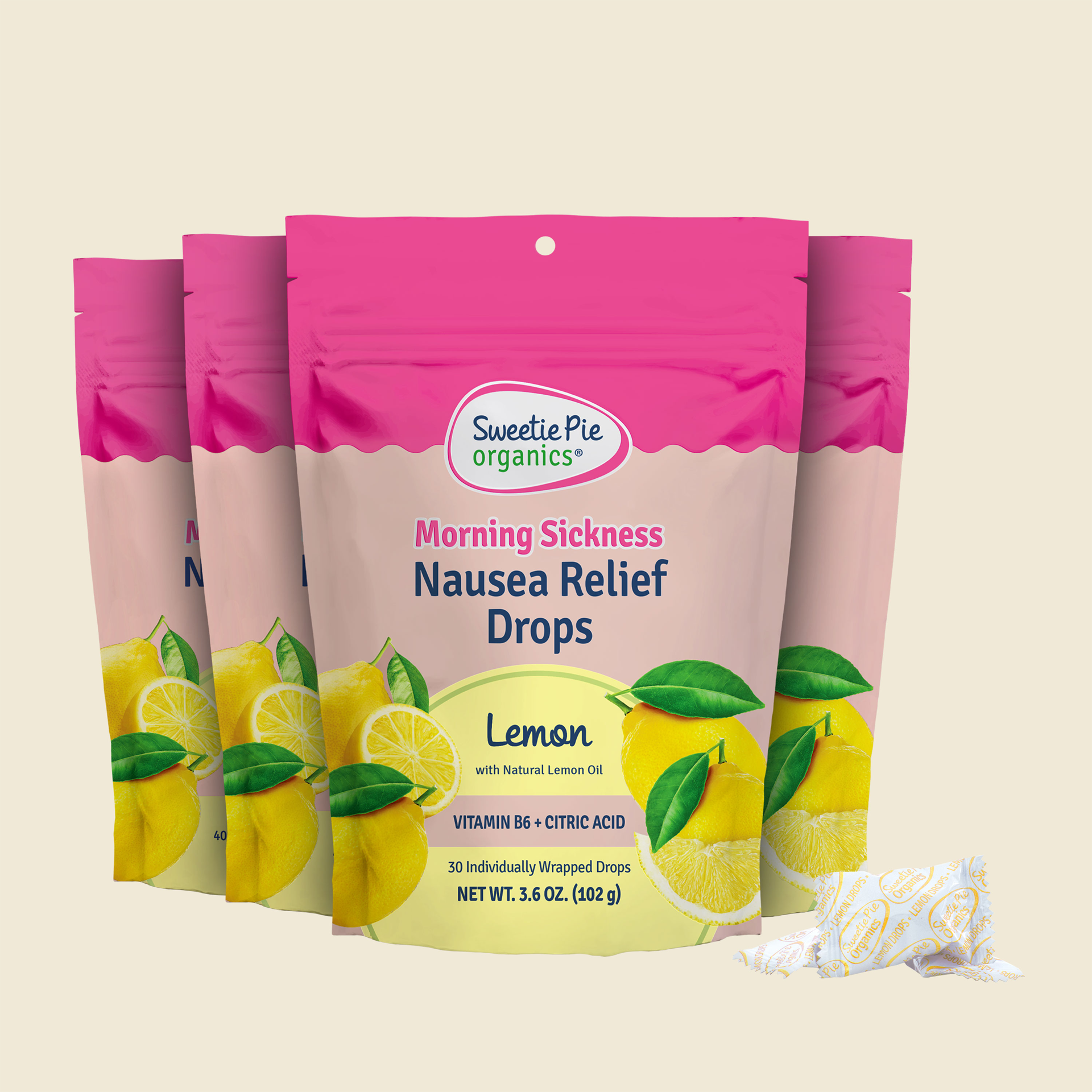 Group of bags of Sweetie Pie's lemon flavored nausea relief drops, with wrapped drop