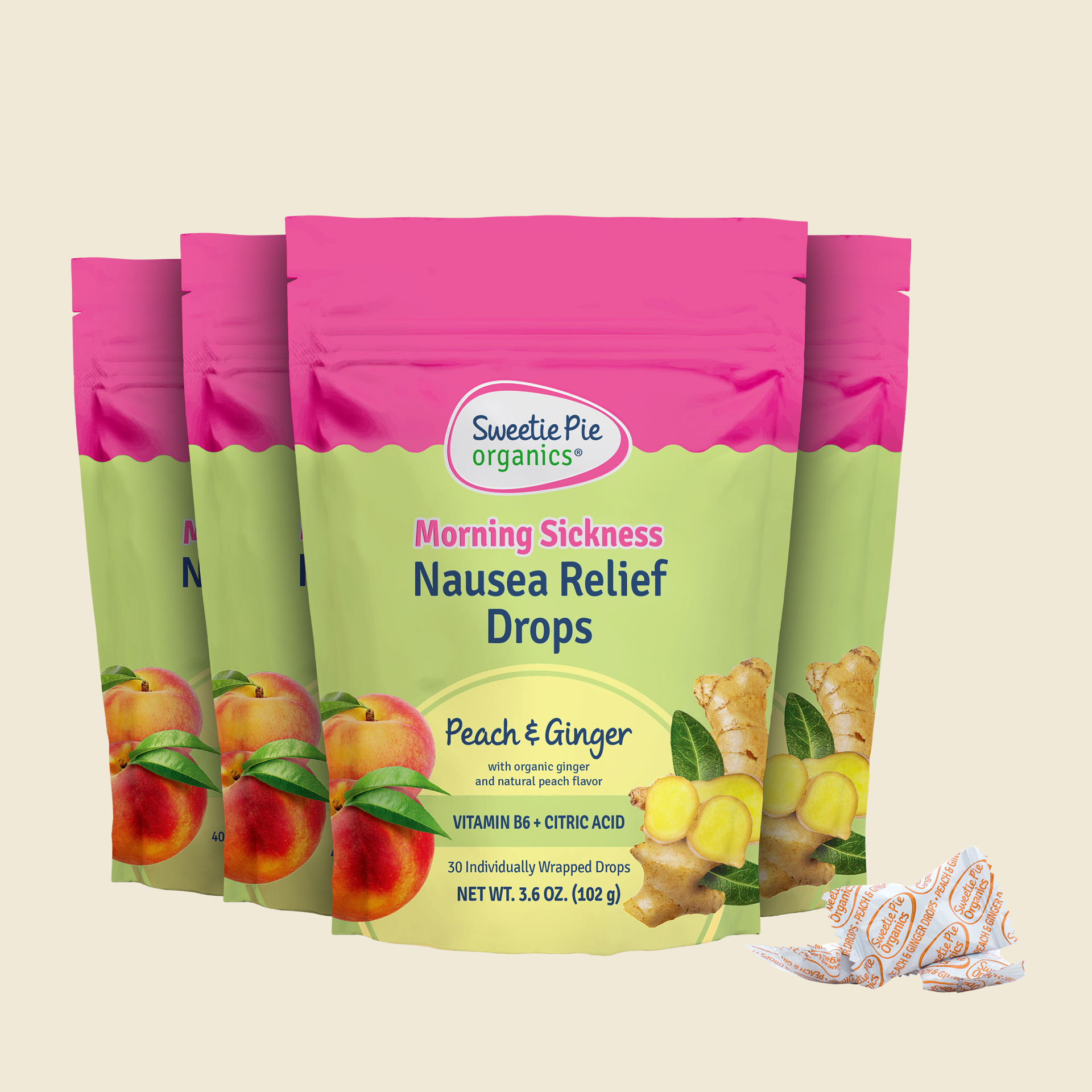 Group of bags of Sweetie Pie's peach & ginger flavored nausea relief drops, with wrapped drop